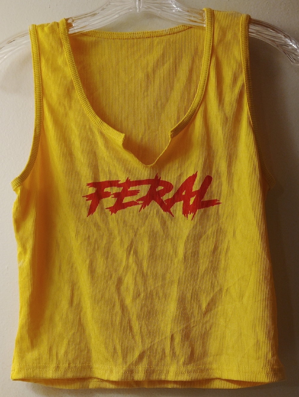 Yellow Ribbed Tank Top with Red 'FERAL' Graphic
